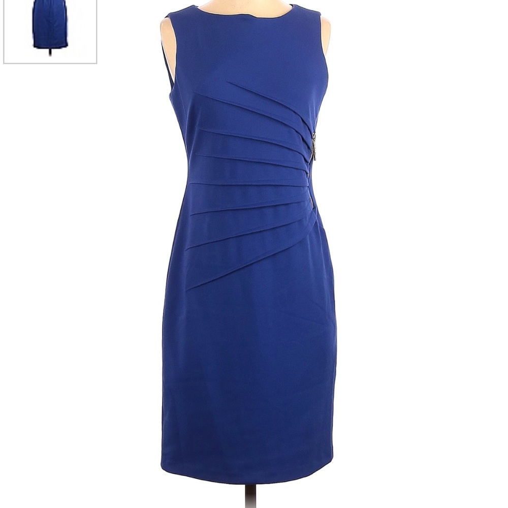 Ivanka Trump sunburst sleeveless blue dress